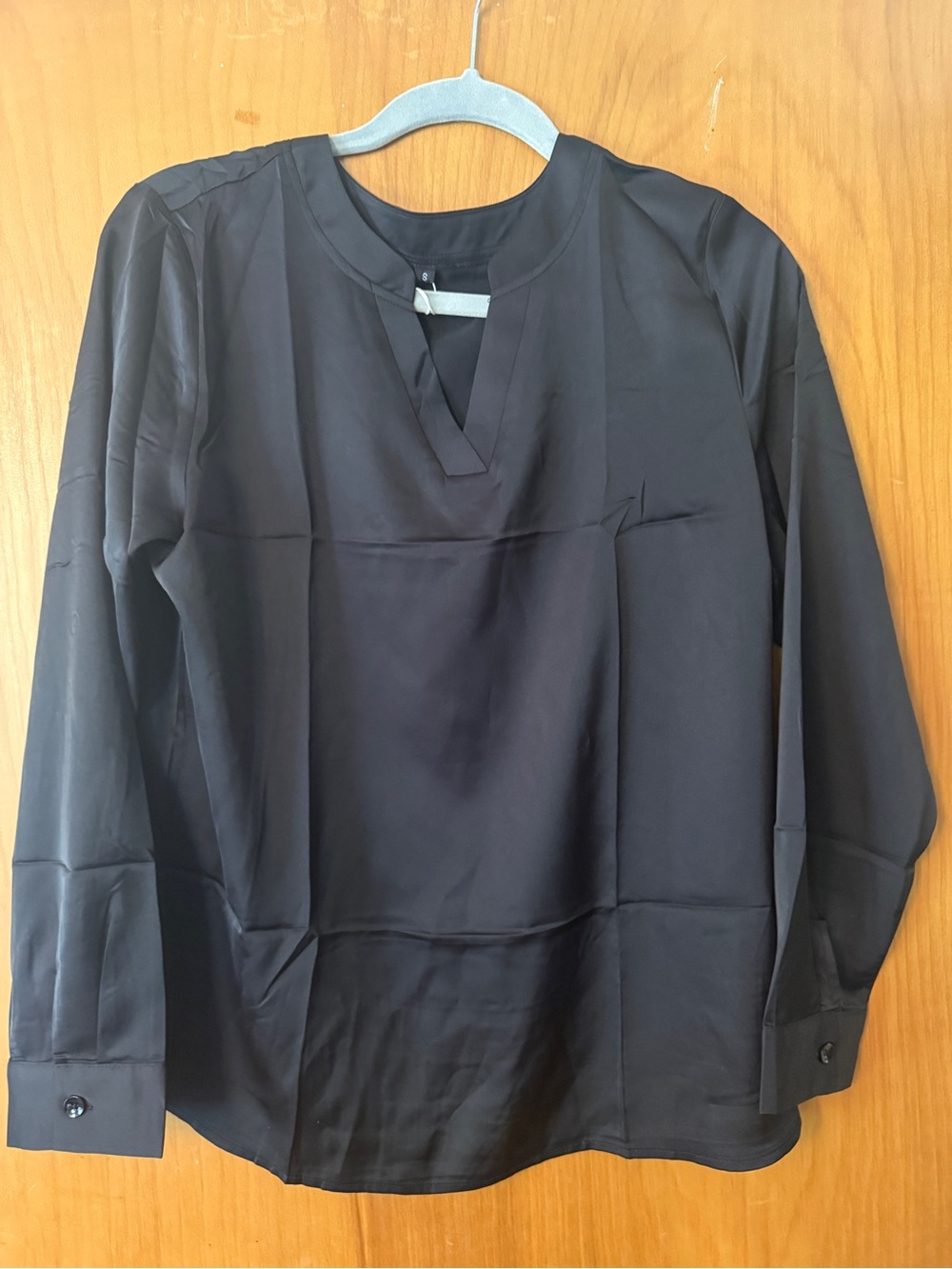 Women’s silky black blouse